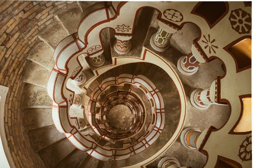 Free Intricate spiral staircase inside ornate Bory Castle, Hungary, showcasing unique architectural design. Stock Photo
