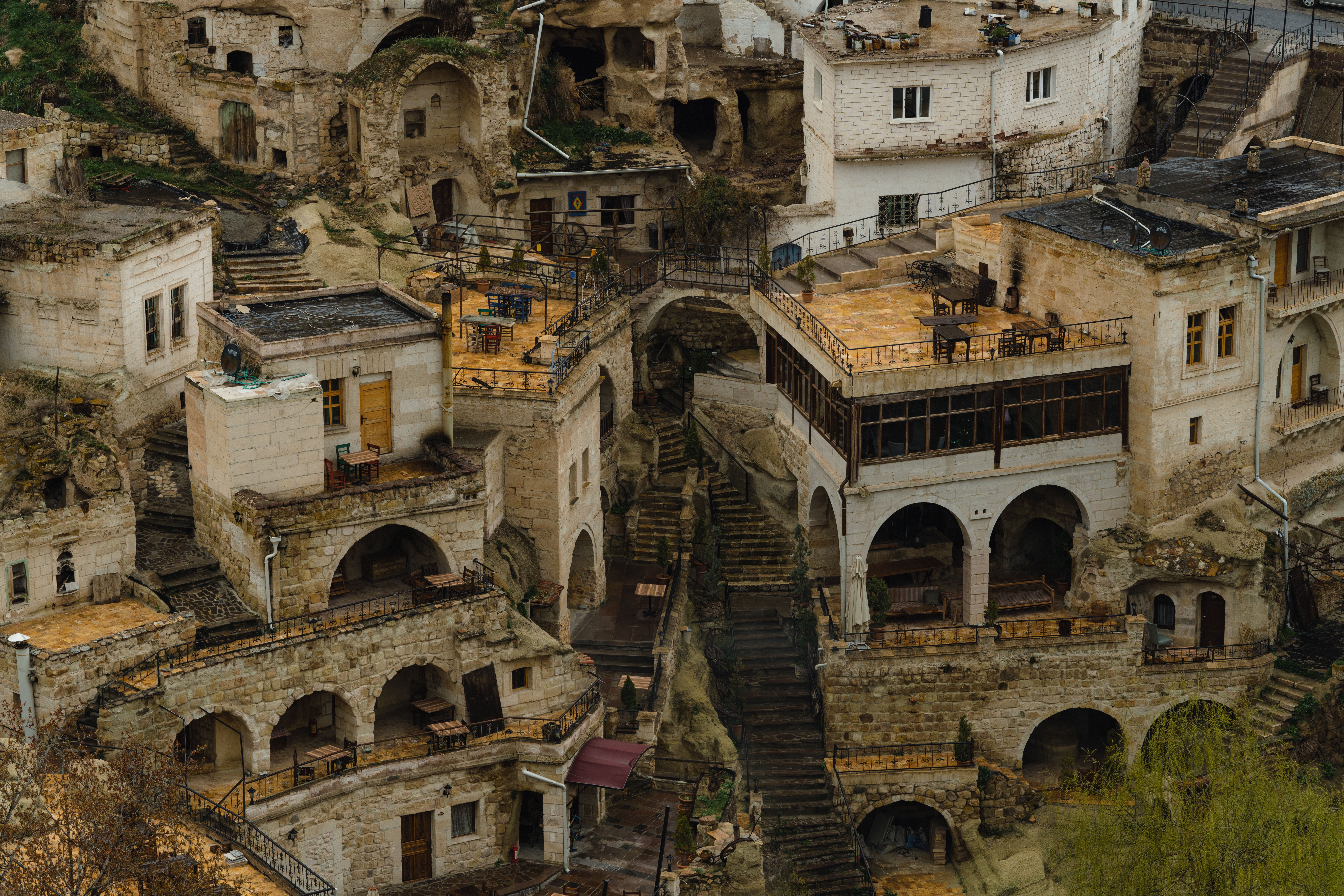 Explore the unique stone architecture of Ortahisar, Turkey from above.