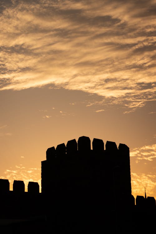 Free stock photo of castle, clouds, golden sunset