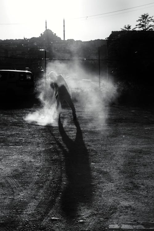 Person Standing in Dust