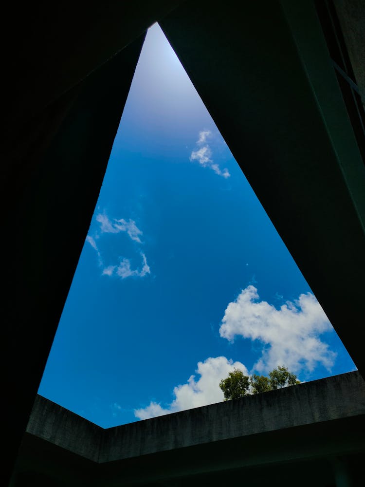 Clear Sky Over Building Walls In Shadow