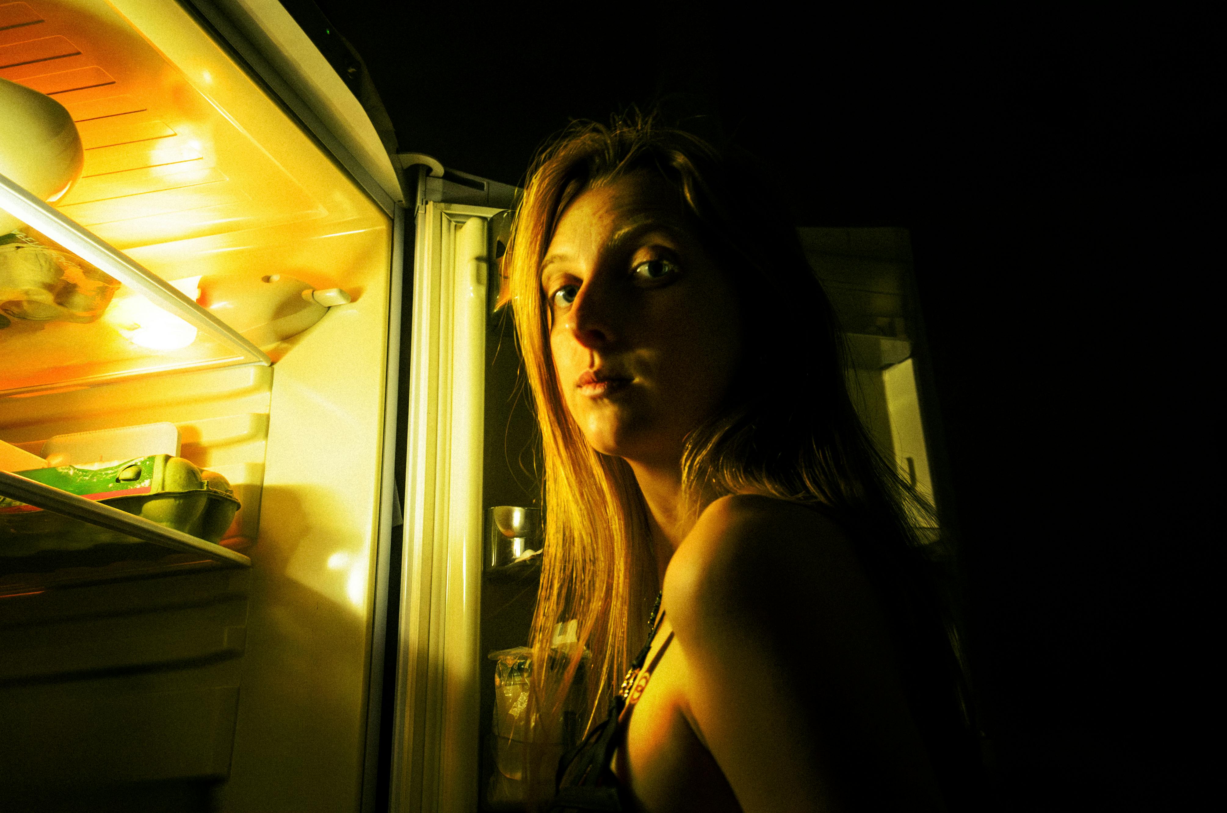 Portrait of Woman by Open Fridge in Darkness · Free Stock Photo, image size:4020x2663