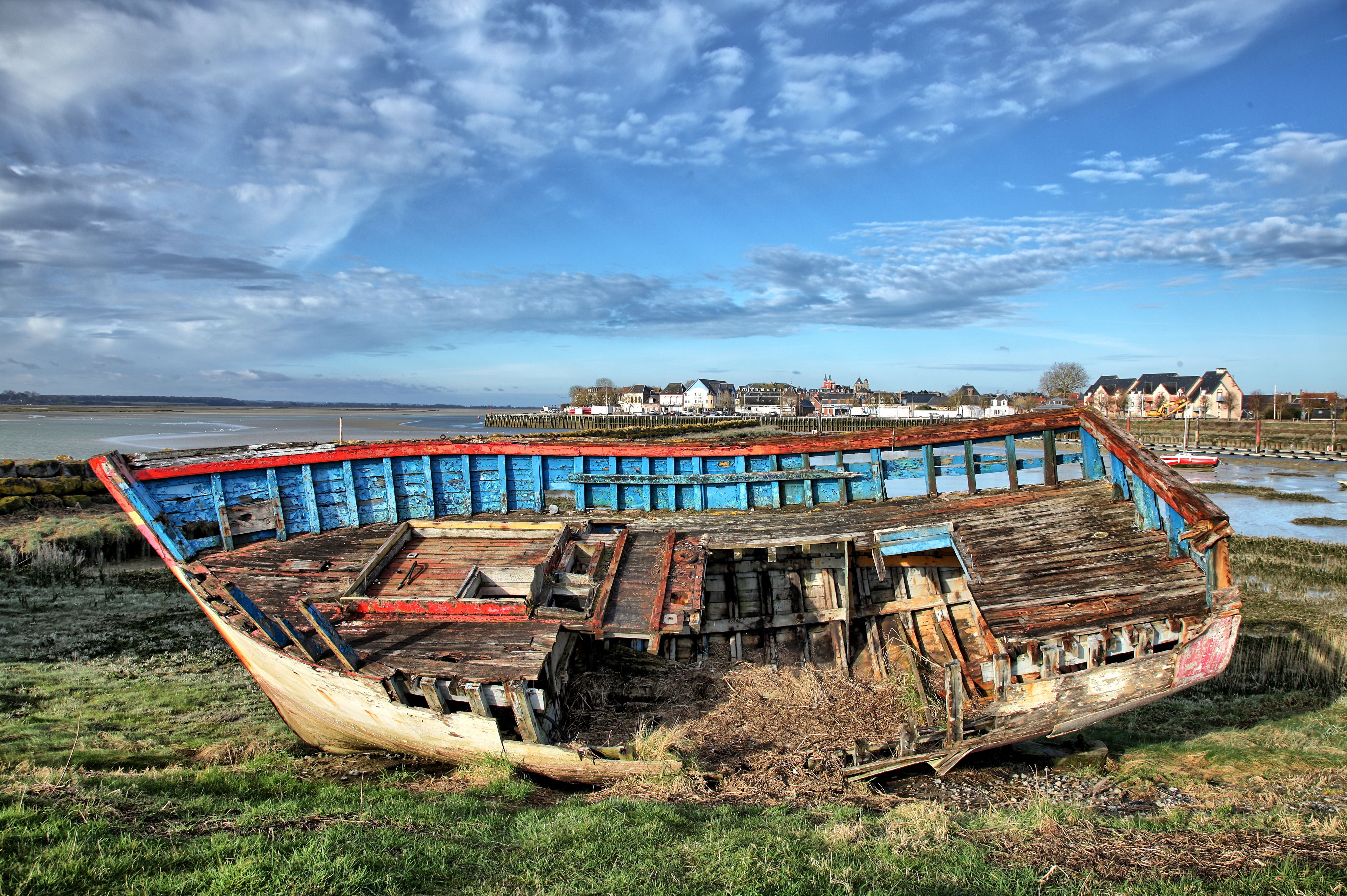Destroyed Boat on Sea Shore in Town · Free Stock Photo