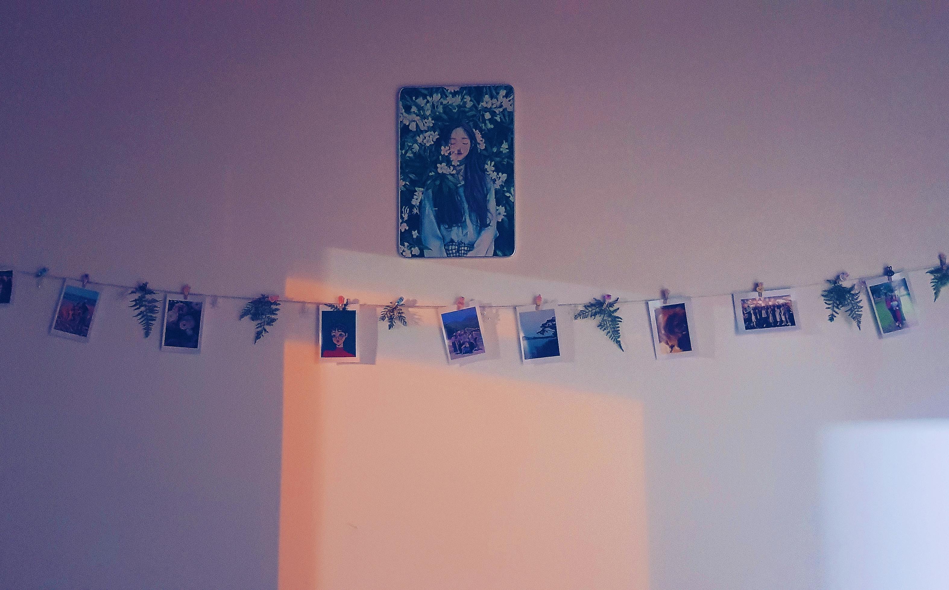 personalized teen bedroom corner with a macrame wall hanging, painted plant pots, and a photo collage - Teen Craft Ideas