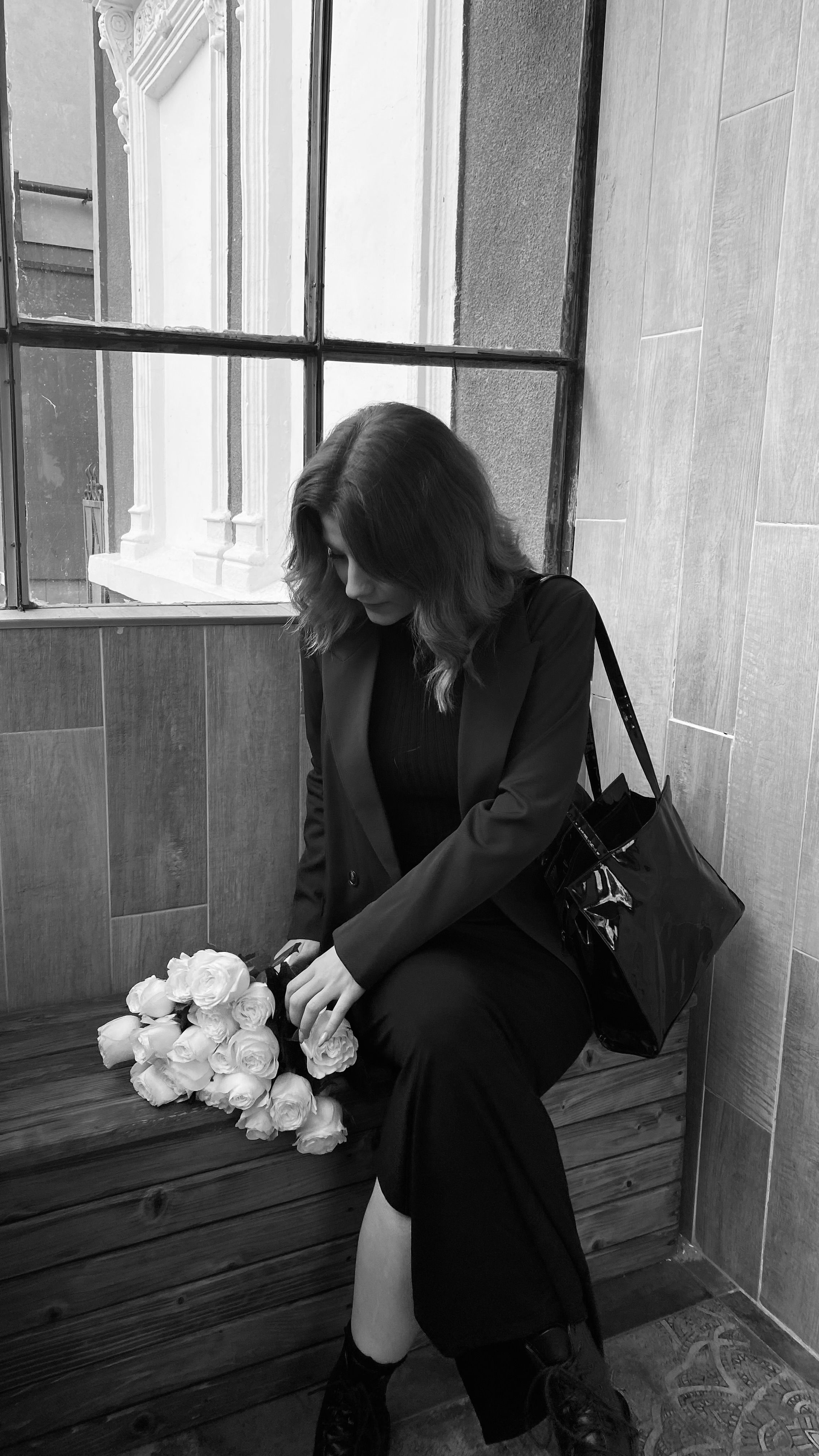 Woman in Black Suit and with Flowers · Free Stock Photo