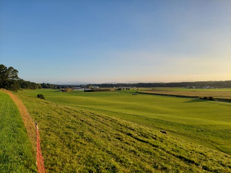 Picturesque countryside view of rural Aying, Bavaria, Germany at sunset.