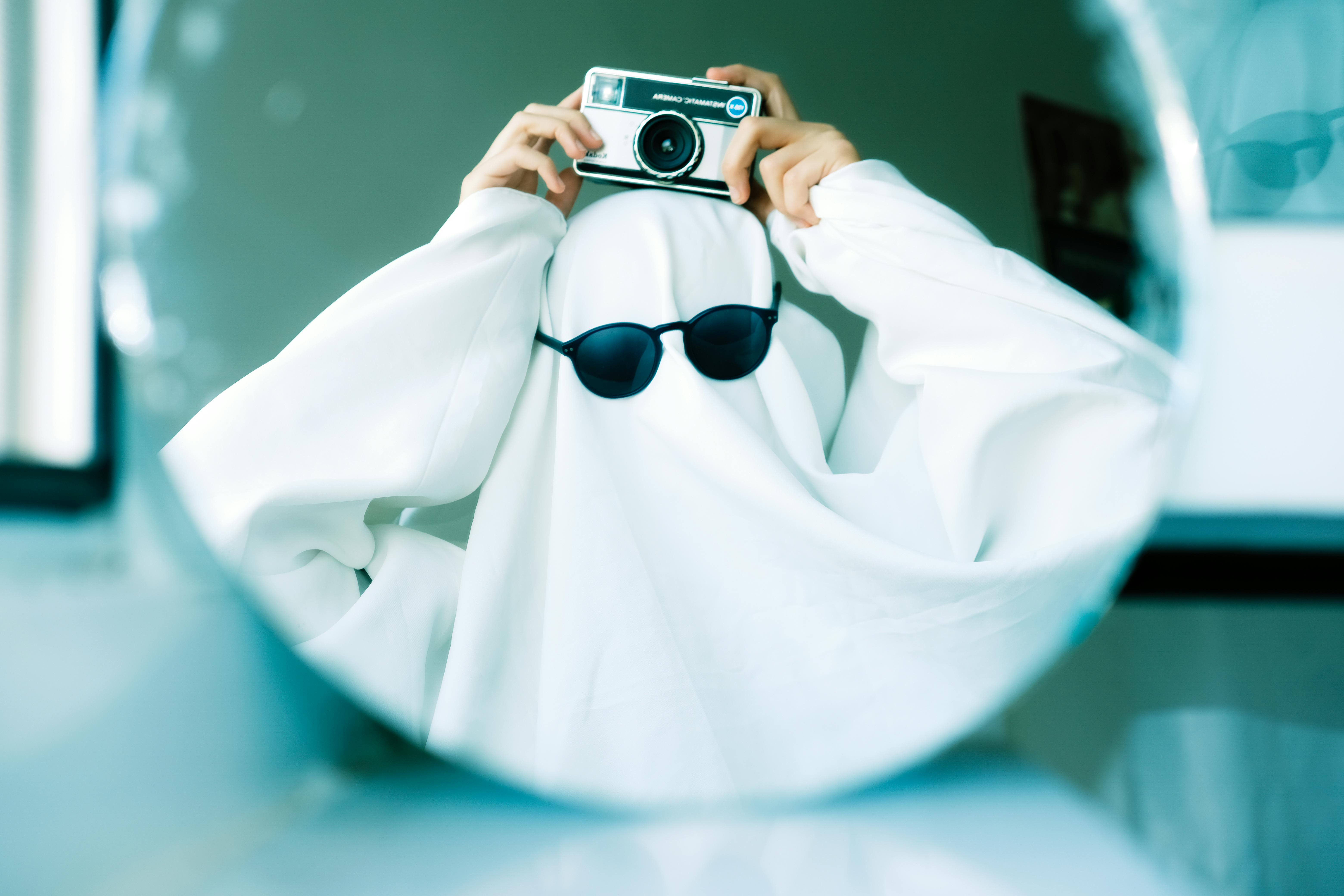 ghost with camera in mirror