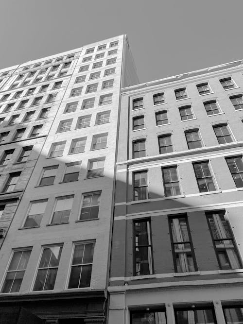 Black and White Shot of City Residential Buildings 