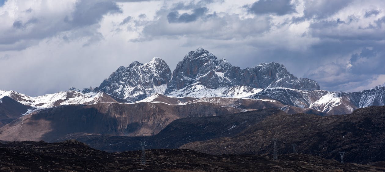 Immagine gratuita di catena montuosa, innevato, inverno