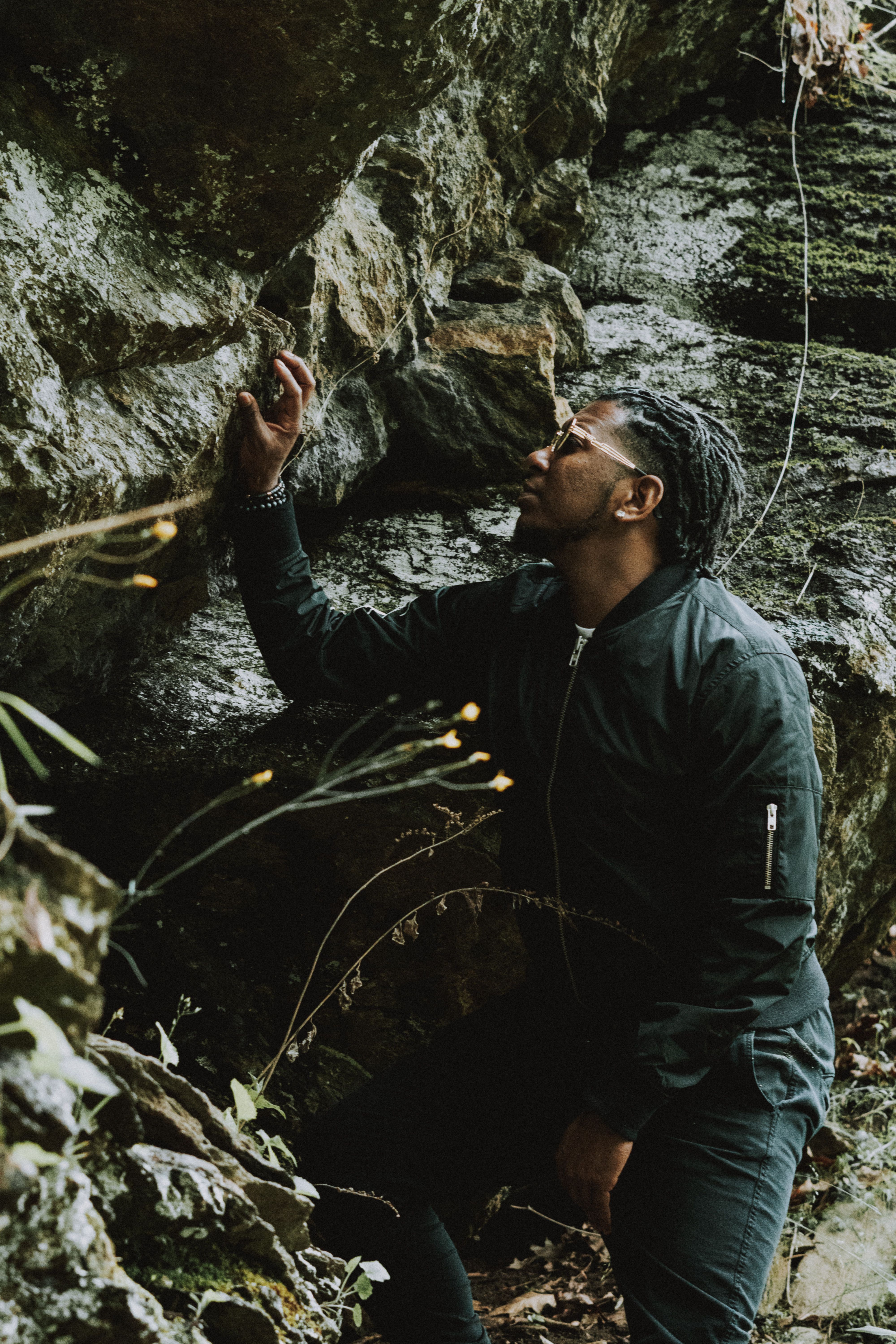 African Man by the Rocks · Free Stock Photo