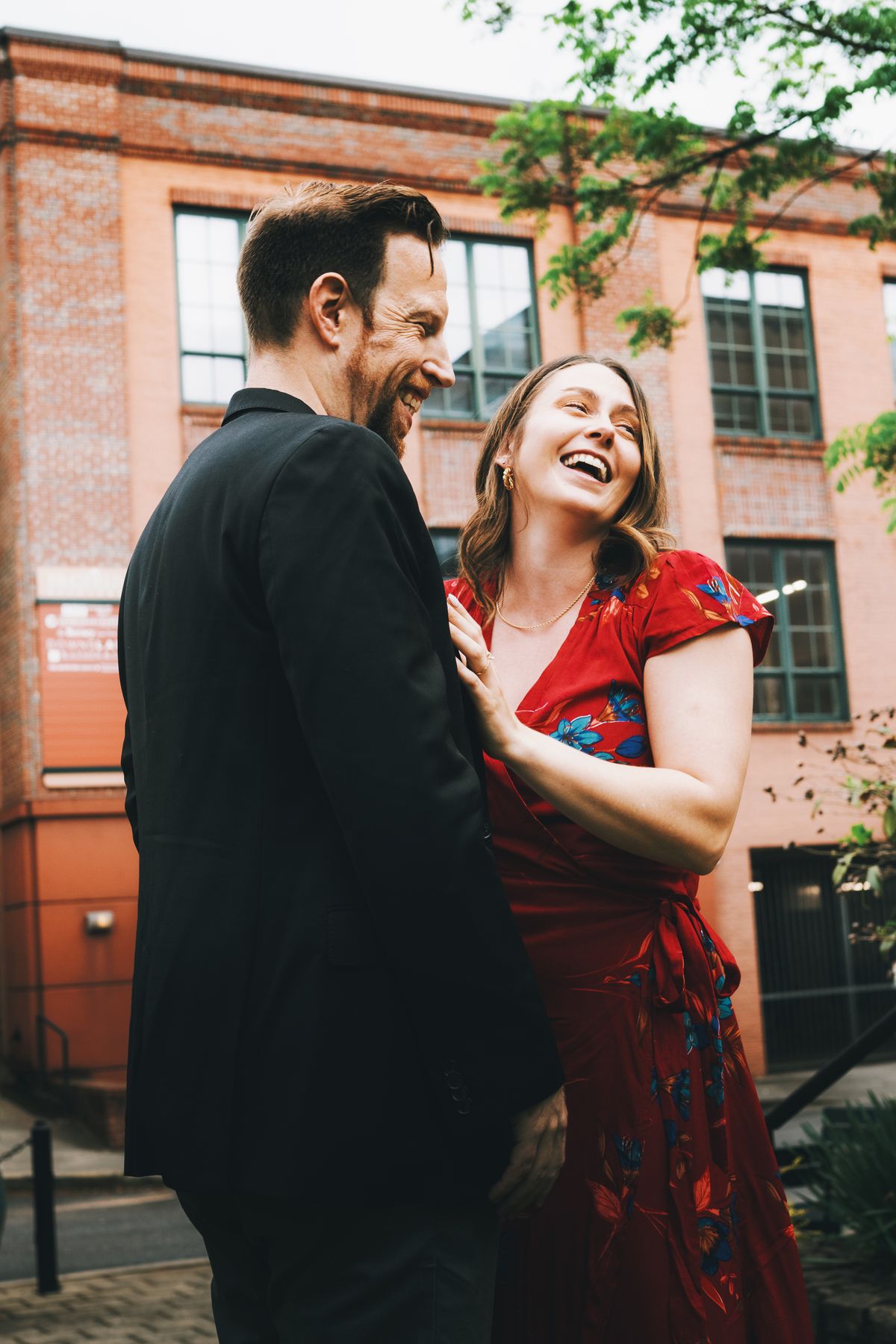 Couple laughing and hugging