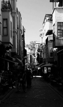 Discover the rustic beauty of a cobblestone street in İstanbul, Türkiye, captured in black and white.