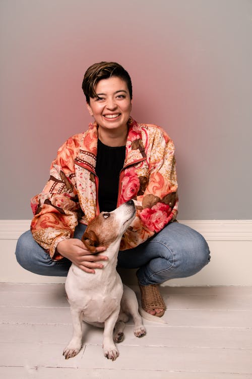 Smiling Woman Posing with Her Dog