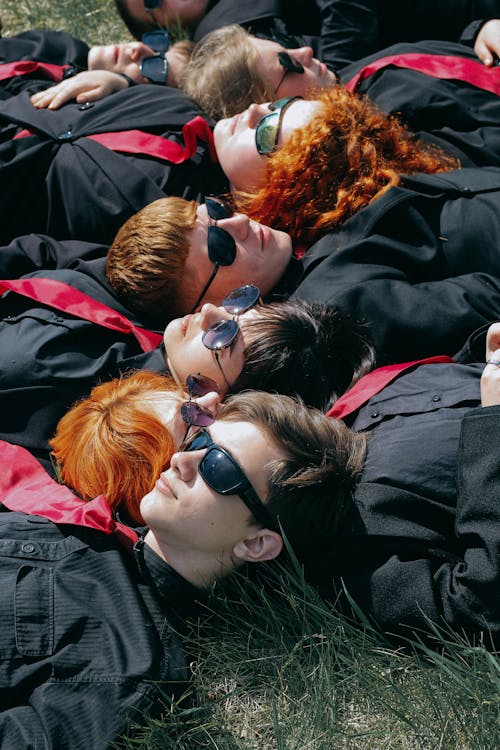 Teenage Boys Wearing Sunglasses on a Meadow