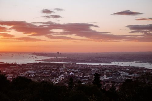 Free Stunning aerial view of Istanbul's skyline and coastline at sunset, capturing urban beauty. Stock Photo