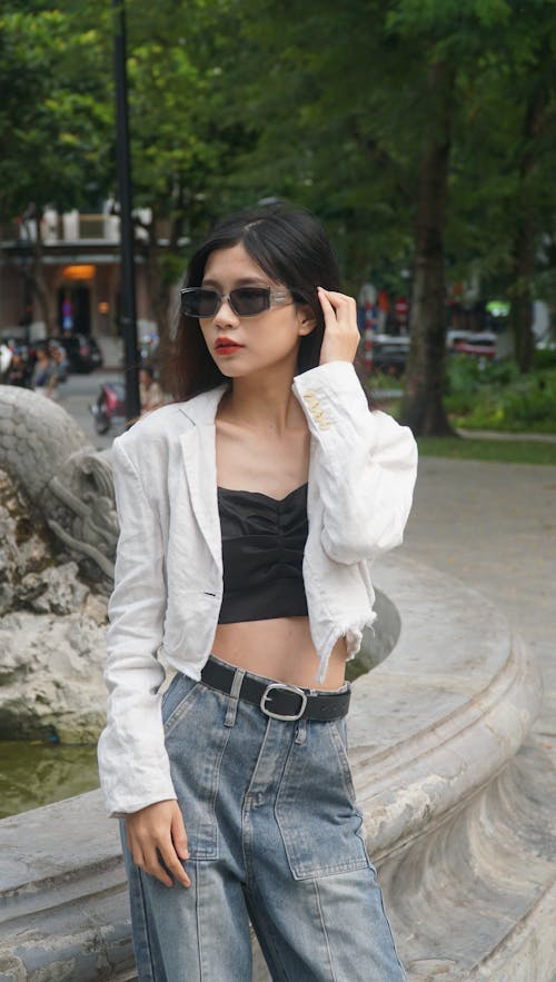 Model Posing in Jeans and Blazer