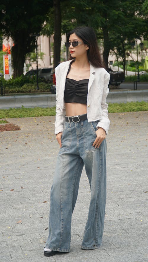 Woman in Sunglasses and Shirt in Park