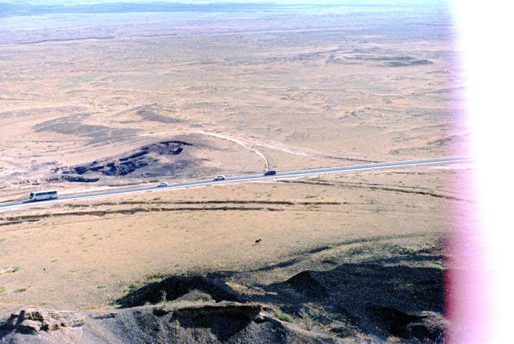 Cars On The Interstate Through The Desert