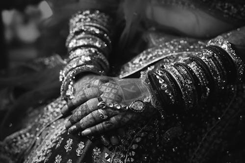 Bride Hands Decorated with Henna Tattoos and Jewelry