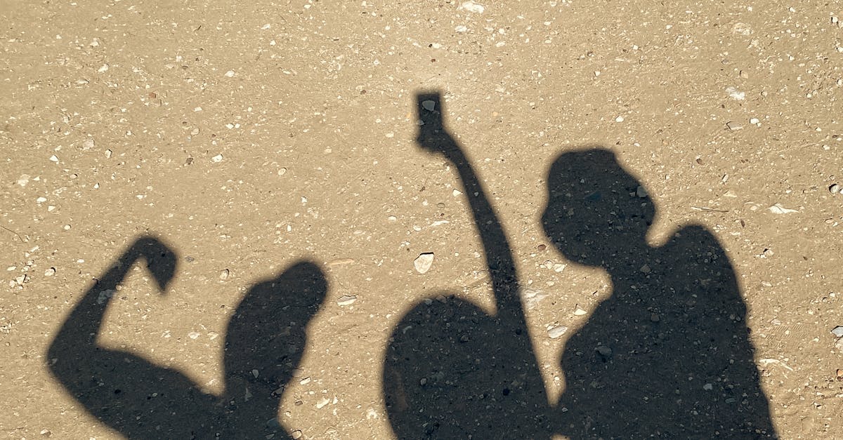 Shadow of Group of Friends on a Beach · Free Stock Photo