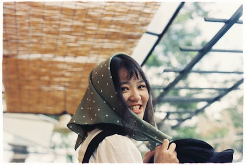 Free Smiling Woman Wearing Scarf Stock Photo
