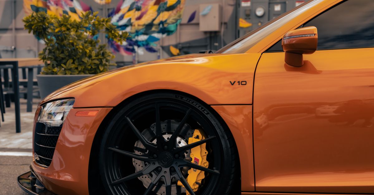 Orange V10 R8 Orange Audi R8 on the Street · Free Stock Photo