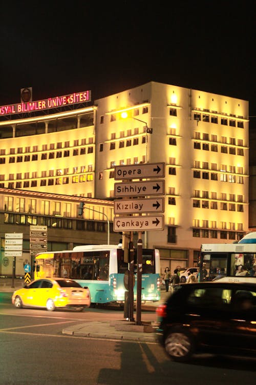 Illuminated Building in City in the Evening 