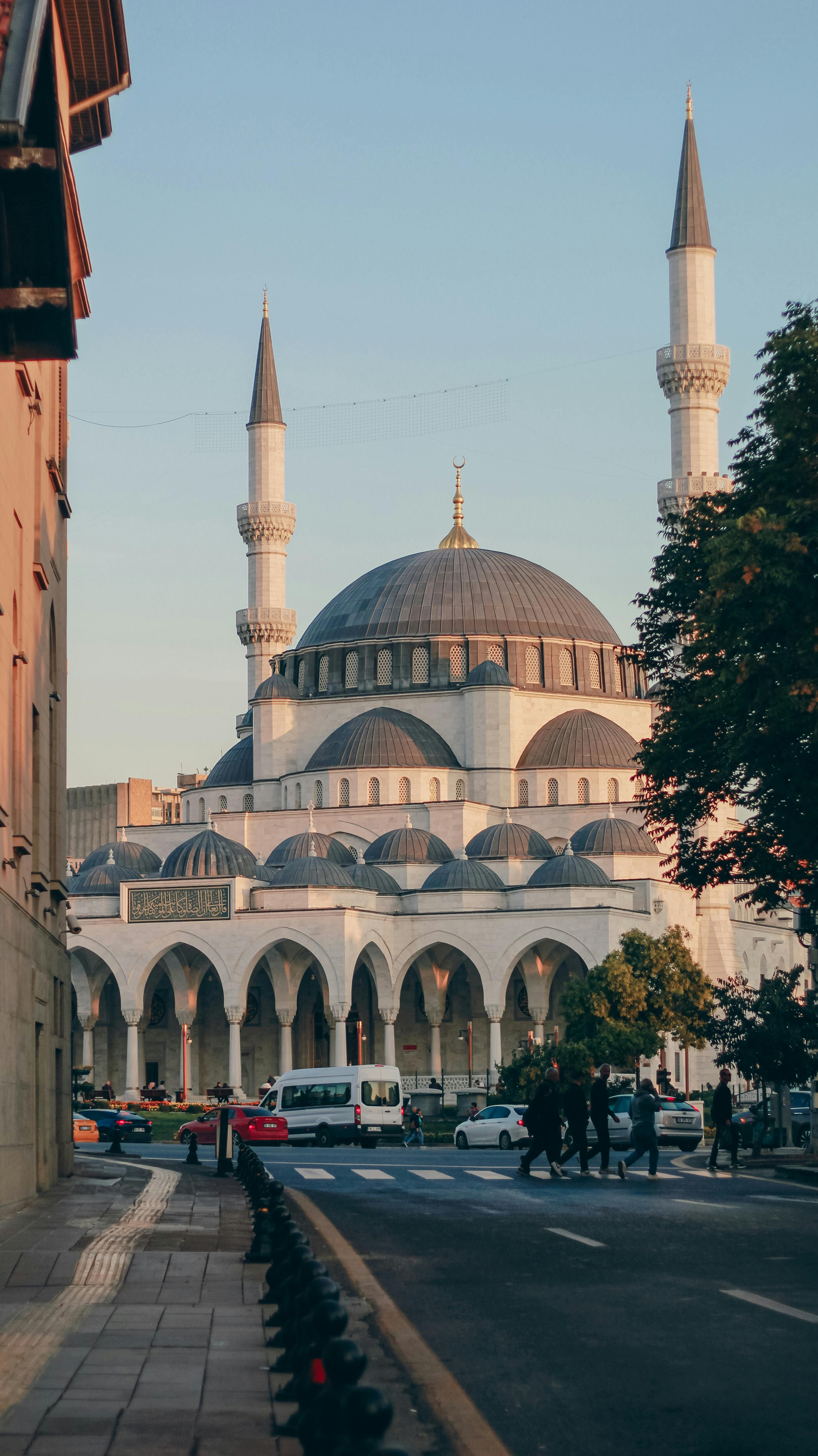 A stunning view of the Melike Hatun Mosque in Ankara, Turkey at sunset, showcasing its architectural beauty.