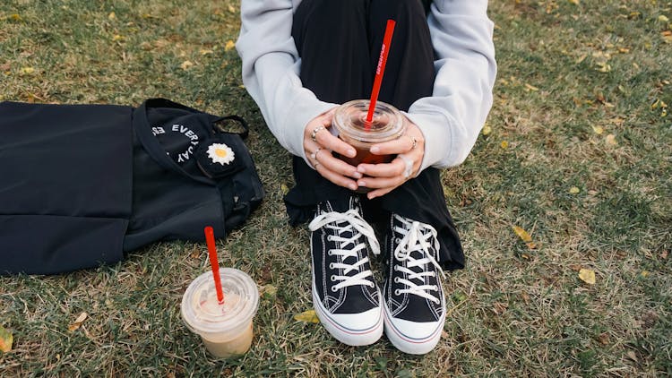 Sitting On The Grass With Cups Of Coffee From Turkish Espressolab Cafe