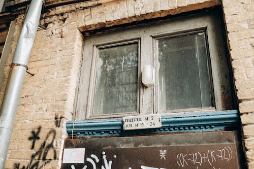 Closed Windows on Vintage Building Wall