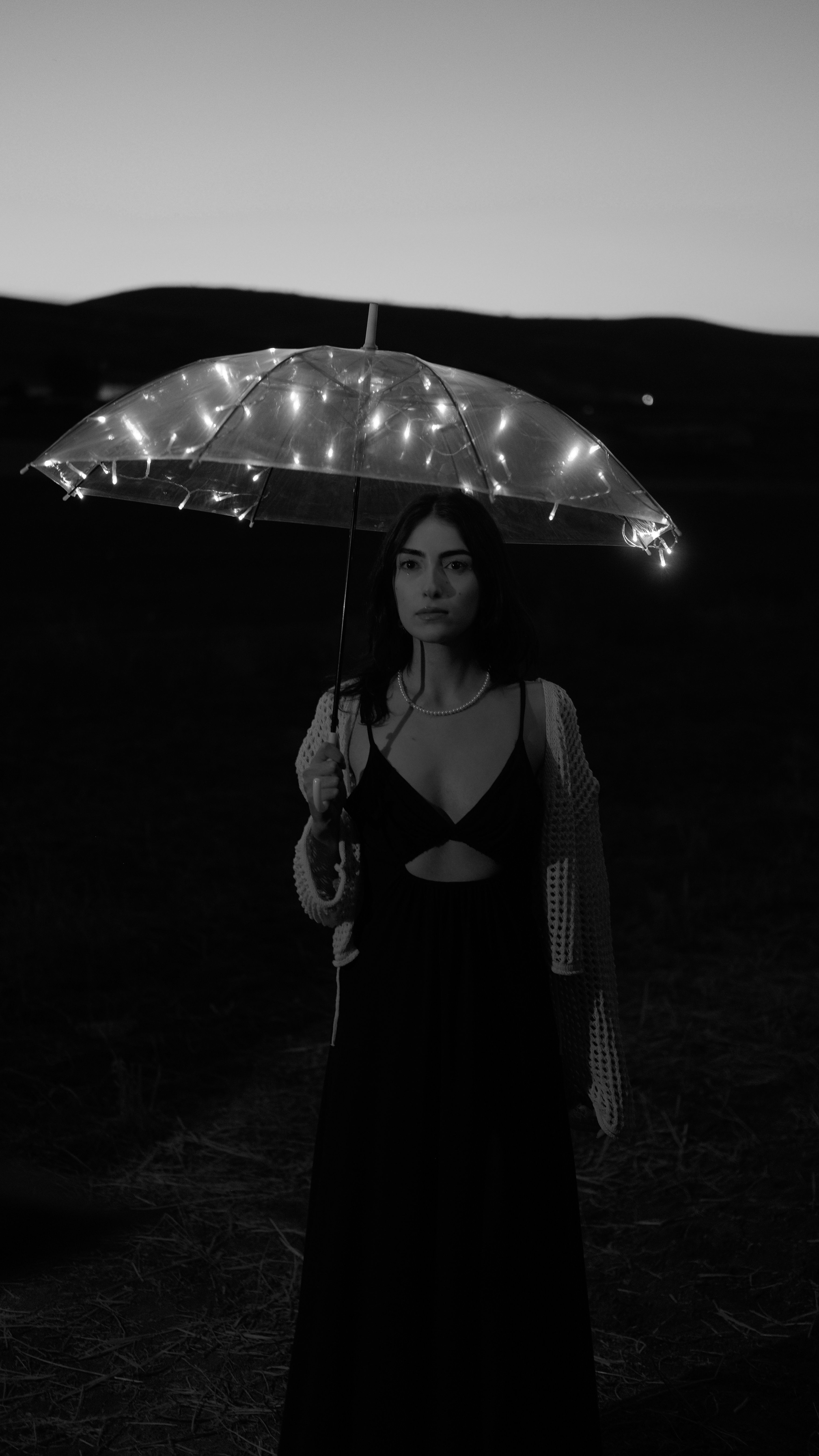 Woman Holding an Umbrella in Black and White · Free Stock Photo