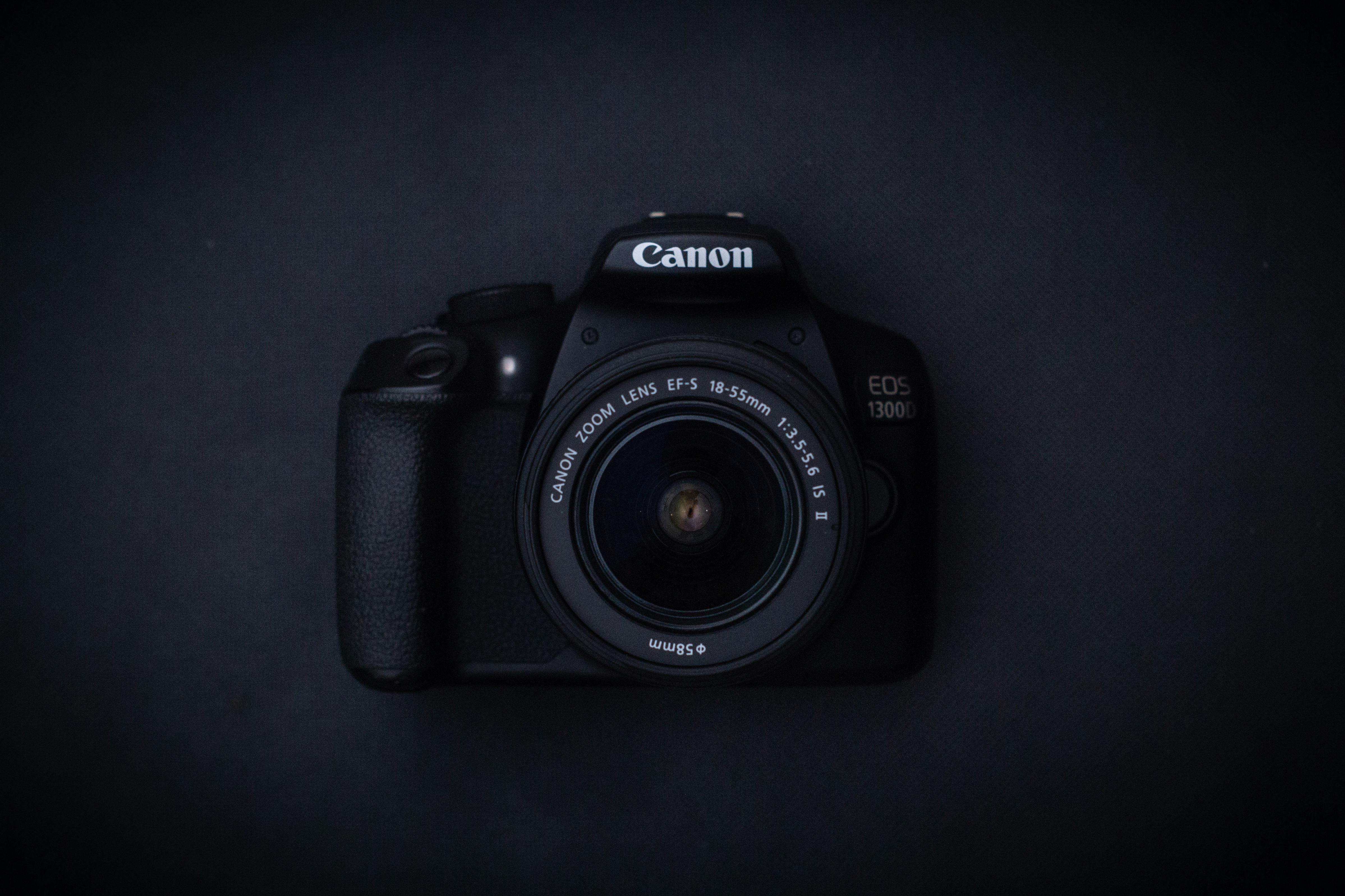 Detailed image of a Canon DSLR camera showcasing its sleek design and lens.