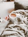 Person Holding Coffee Filled Mug