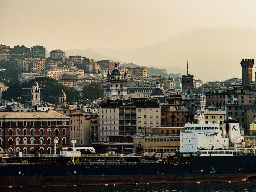 Explore the charming architecture of Genoa, Italy with this stunning cityscape view.