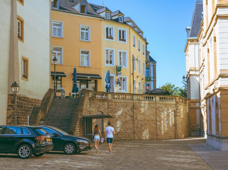 Couple Walking In Alley In Luxembourg