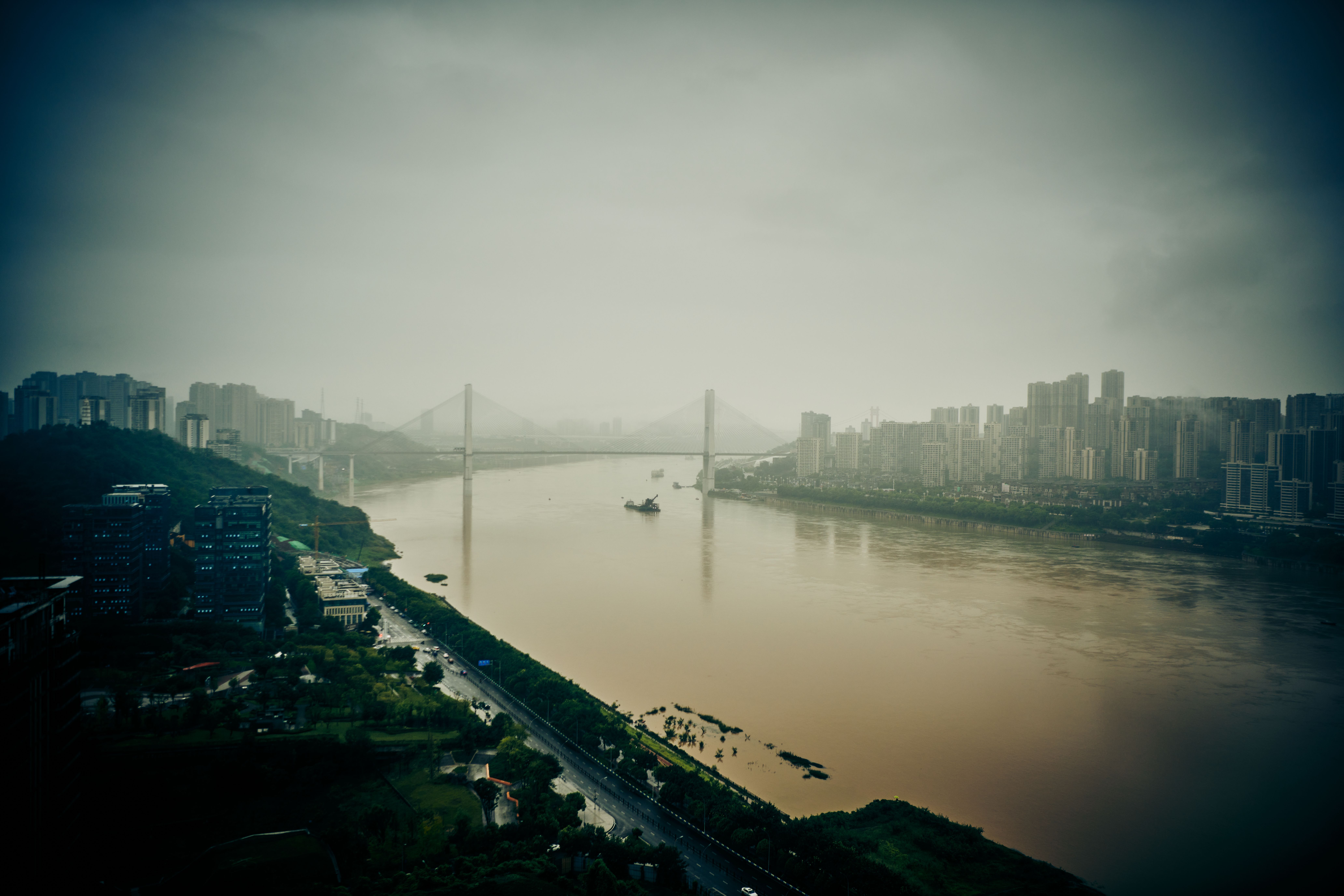 Aerial view of a hazy cityscape.