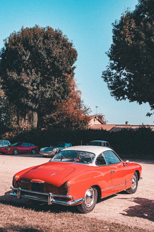 Red Old-fashioned Car on Parking