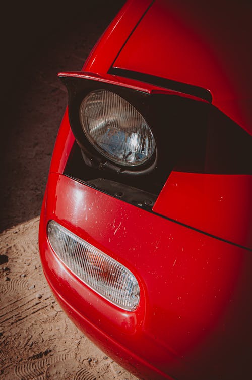 Pop Up Headlight of Red Car