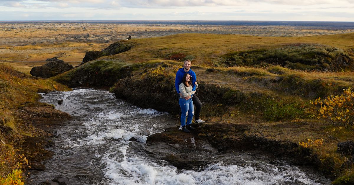 Walk Besides Stream A person walking across a stream in the middle of a field · Free Stock ...