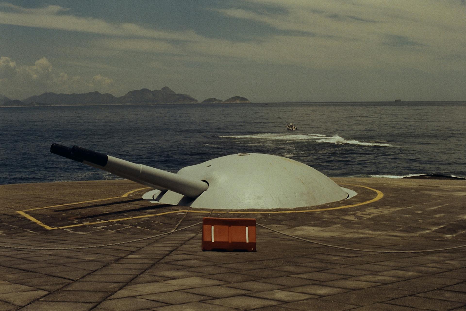 Gray and Brown Battle Tank on Body of Water