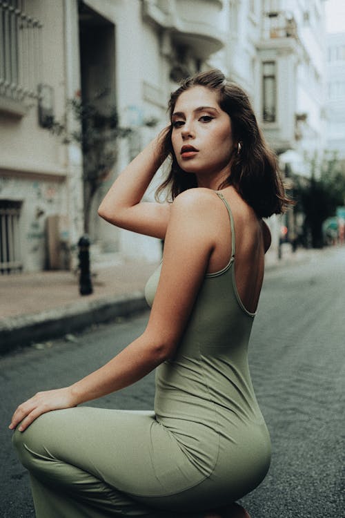 Model in Green Dress on Street