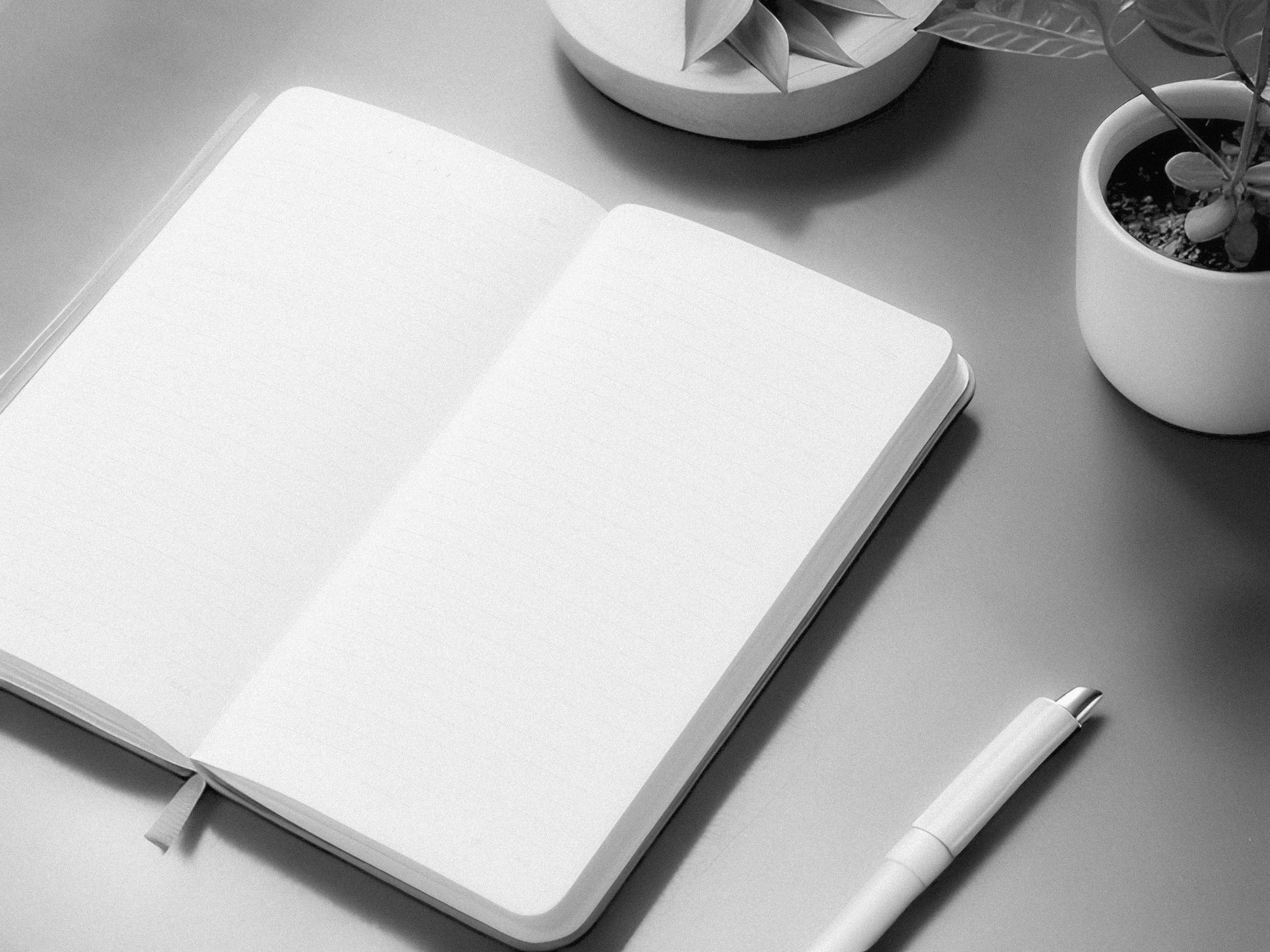 Download free image of Blank plain white notebook page with a pen