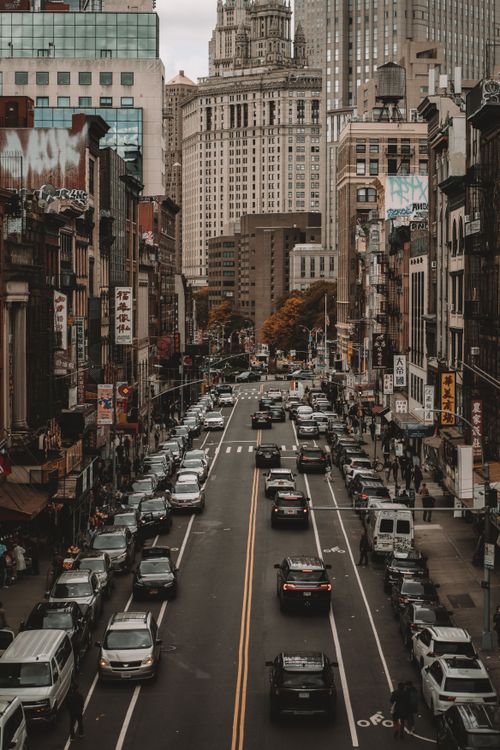 Free Vibrant city street view in New York City showcasing busy traffic and urban life. Stock Photo