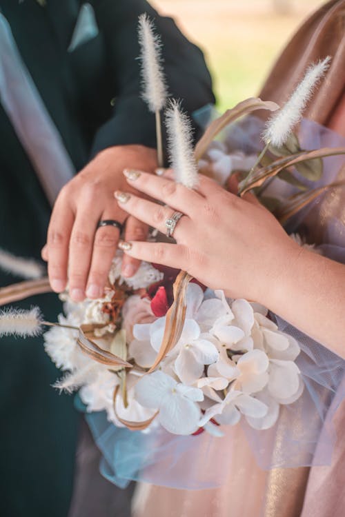 Bride Holding a Bouquet of Flowers 