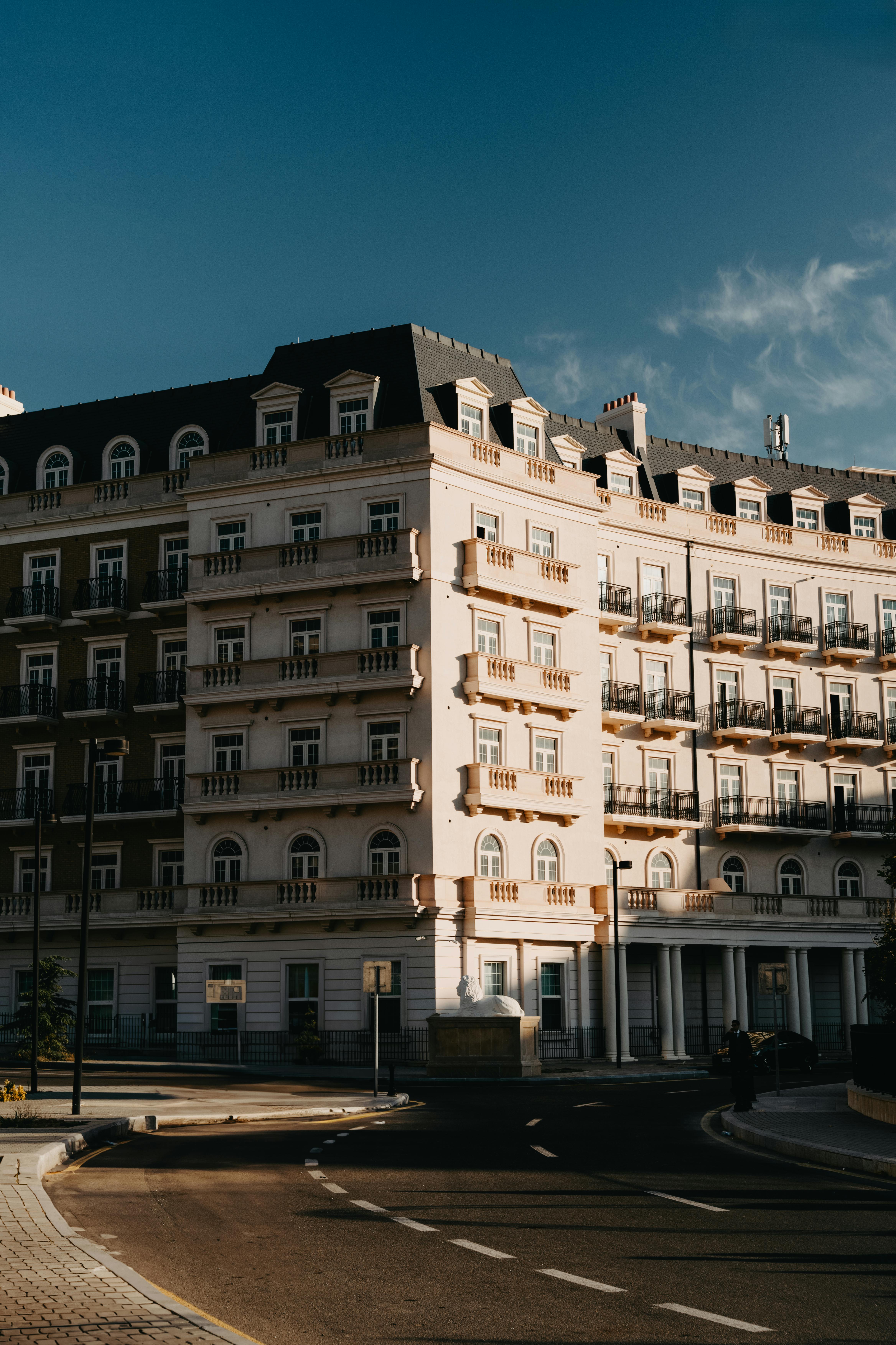 Sunlit facade of a classical building in Baku, Azerbaijan's city streets. Captures architectural charm.