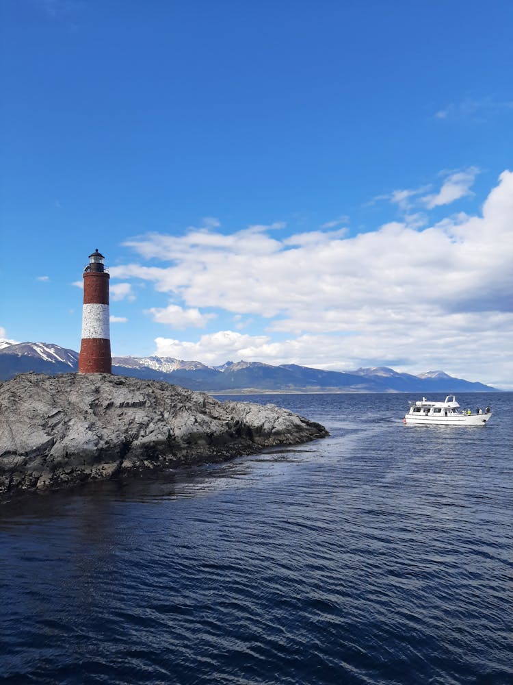 Les Eclaireurs Lighthouse And A Yacht At Sea 