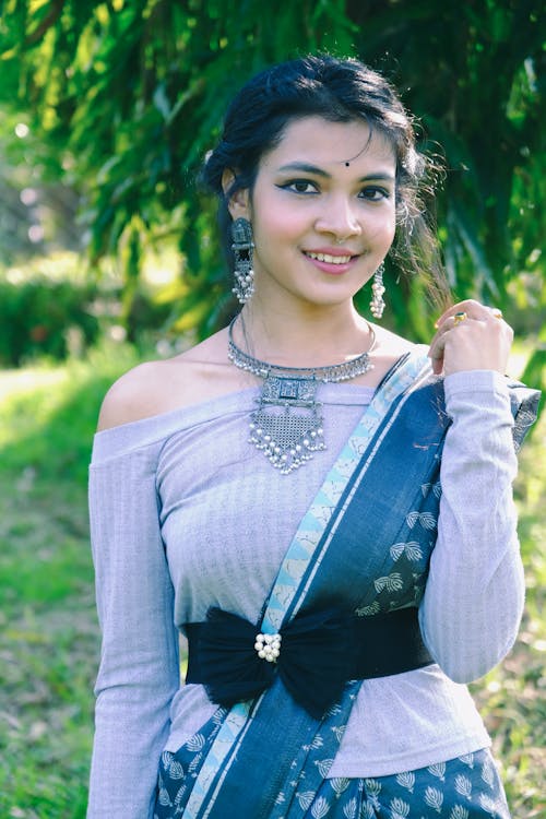 Smiling Brunette in Traditional Jewelry