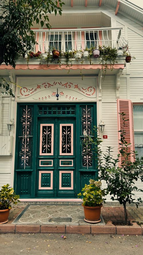Free Beautiful ornate green and pink door on a decorative facade in Istanbul, Turkey. Stock Photo