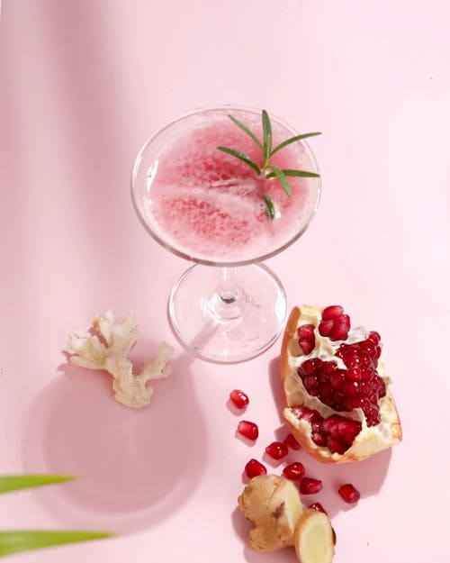 Pomegranate Cocktail with a Sprig of Rosemary