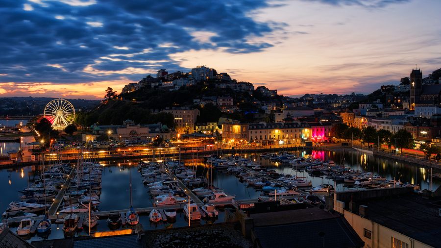 Torquay harbour and seafront at dusk in Devon